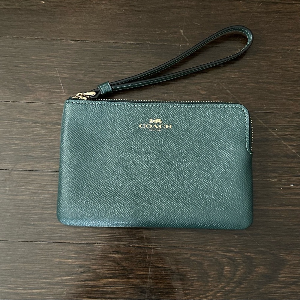 Dark green metallic coach wristlet